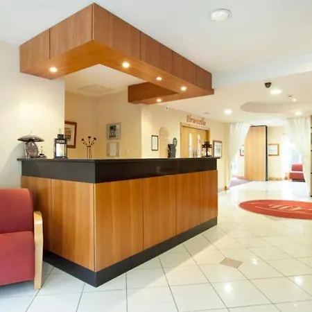 The At Woodenbridge آركلو